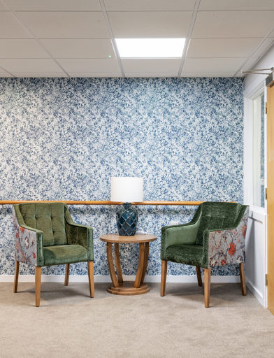 a seating area in a hallway 