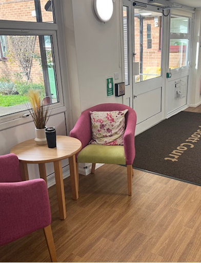 Colourful and comfortable chairs in an open waiting area 