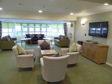 Internal photo of the residents lounge at Absalom Court