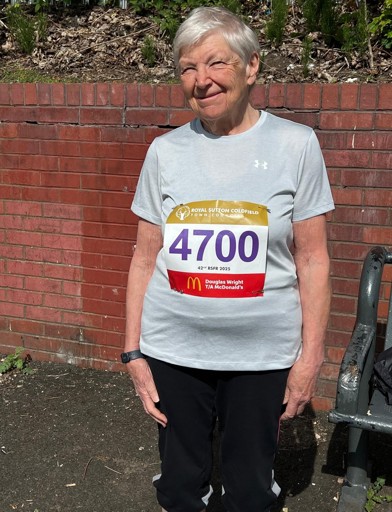 Judith in shorts and t-shirt ready for a fun run 