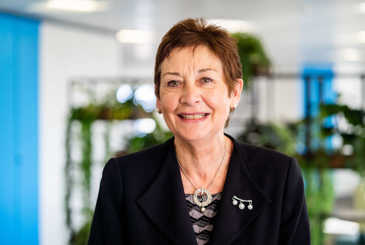 Chair of the Board Elaine Elkington smiles at the camera 