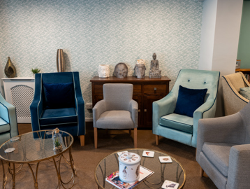 Modern communal lounge with turquoise decor