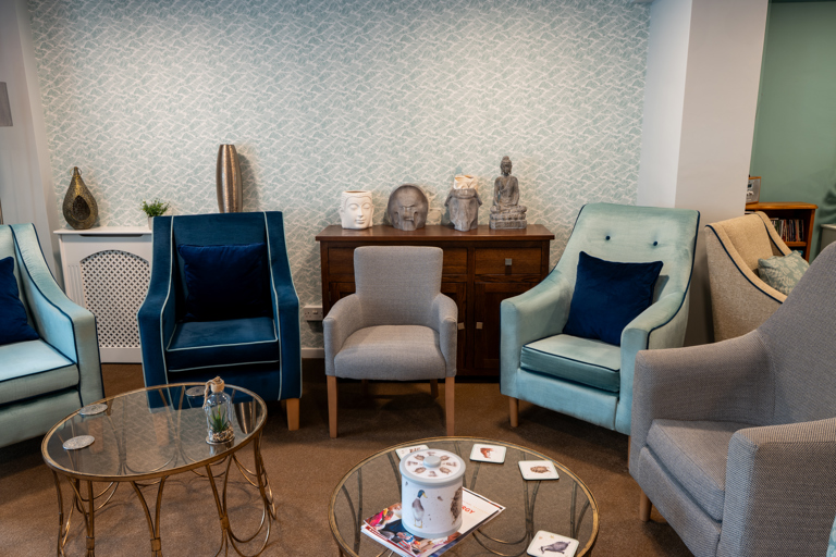 Modern communal lounge with turquoise decor