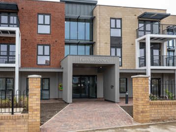 The outer building entrance to Fern Meadows