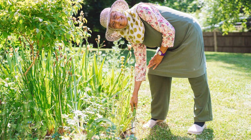 A Retirement Living resident in the garden