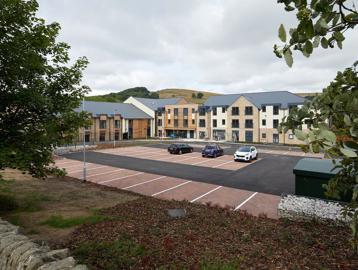 Wide-angle view of the car park and Thomas Fields scheme behind