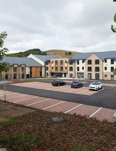 Wide-angle view of the car park and Thomas Fields scheme behind 
