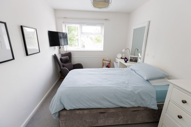 bedroom with white walls