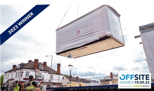 A banner showing that Patent House scheme are 2023 winners of the offsite awards. The image depicts construction workers lowering a large unit with ropes.