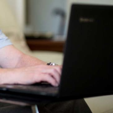 Housing 21 Resident With Laptop