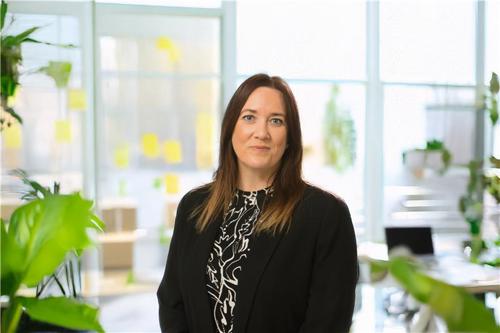 Woman wearing black blazer