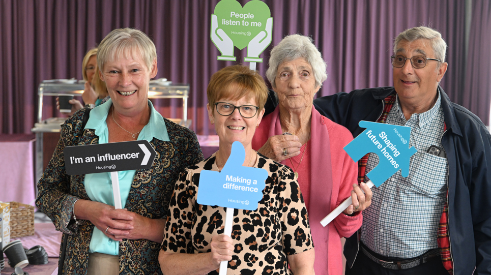 Group of residents smiling at a resident conference in 2025