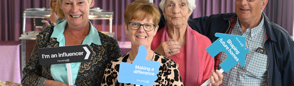 Group of residents smiling at a resident conference in 2025