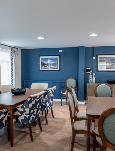 William Griffiths Court internal shot: Communal seating area with dining tables and chairs 