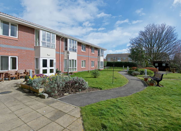 Curved pathway through the rear garden at Applegarth Court
