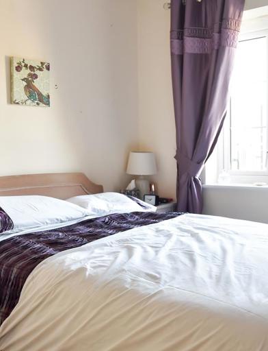 Double bedroom in a resident's apartment