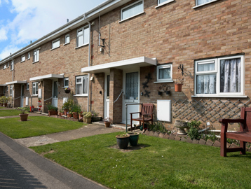 Front gardens, plant pots and seating outside of resident's homes