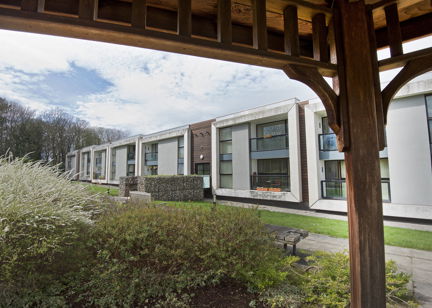 A view from the side of Brookside House looking through a veranda in the garden