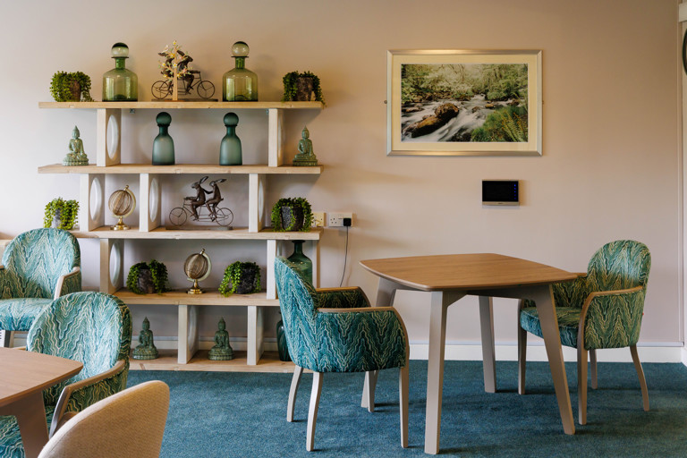 Detailed view of stylish furnishings in communal lounge at Green Lane View