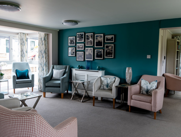 Modern communal lounge with turquoise decor