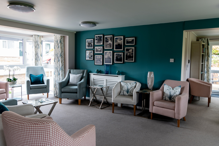 Modern communal lounge with turquoise decor