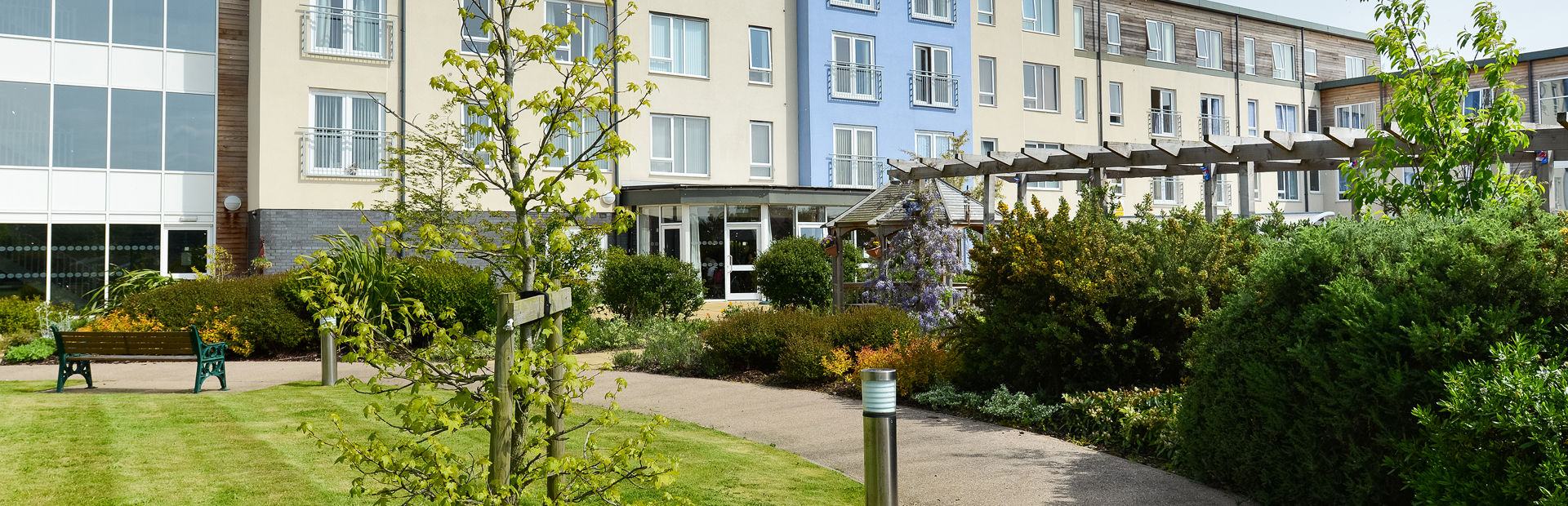 Curved path leading through the front garden to the entrance of Westhall Court