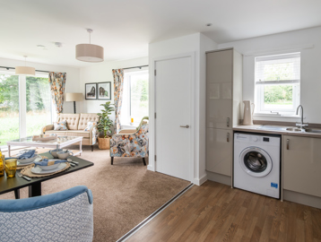 Inside the show home with large, open plan kitchen-diner and lounge area