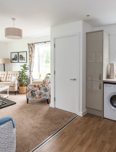 Inside the show home with large, open plan kitchen-diner and lounge area 