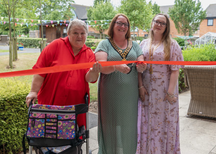 Resident Patricia with the Mayor ready for the ribbon cutting ceremony