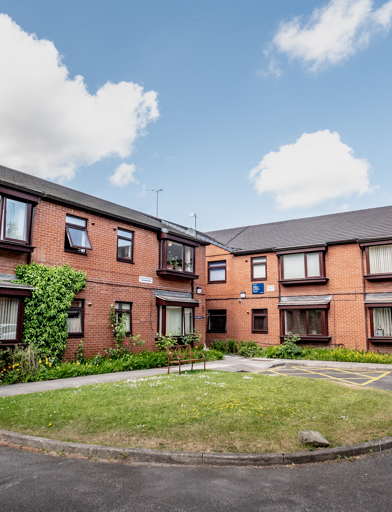 William Griffiths Court External Bench and green area outside the scheme 