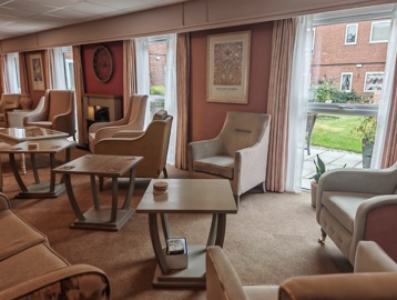 A communal seating area with armchairs