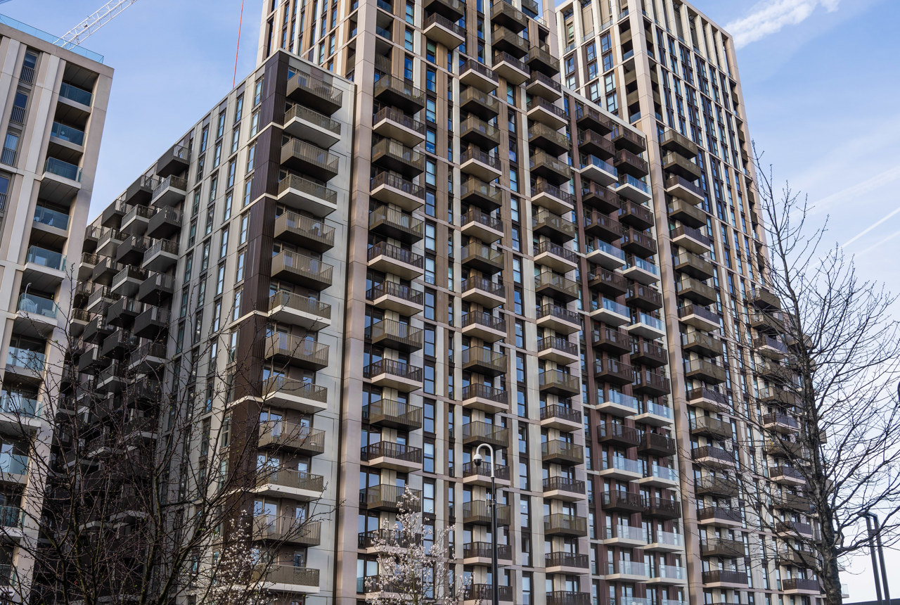 Photograph outside Minterne Apartments Extra Care scheme with a blue sky