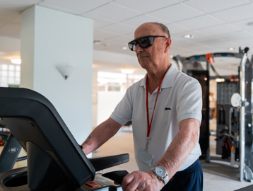 A male resident enjoy some time on the treadmill in the on-site gym