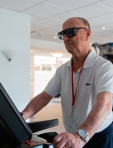 A male resident enjoy some time on the treadmill in the on-site gym 