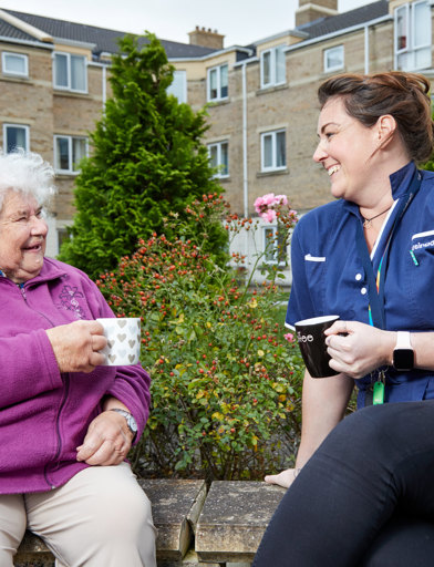 EC Linskill Park Careworker Resident Smiling Talking Garden 