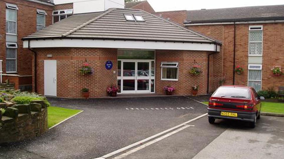 A photo of the front entrance of Devonshire Court