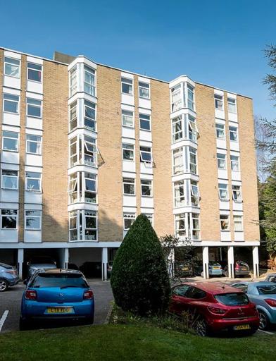 Car park and grassed area to the outside of the scheme