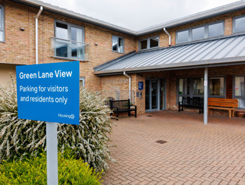 Entrance of Green Lane View with visible sign