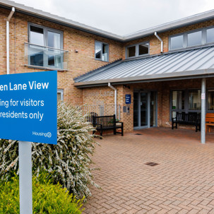 Entrance of Green Lane View with visible sign