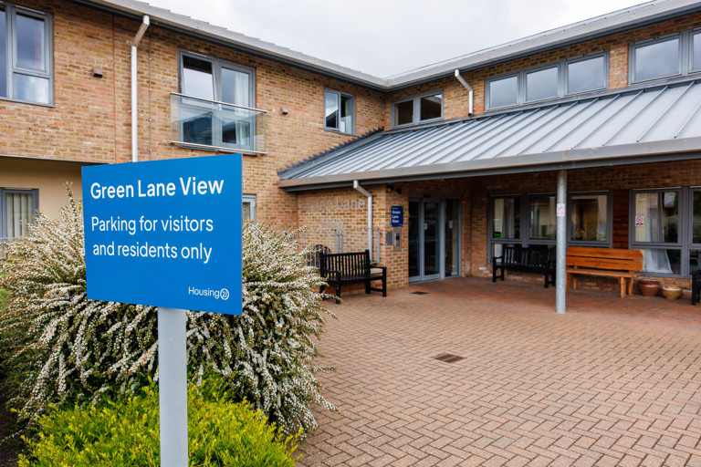 Entrance of Green Lane View with visible sign