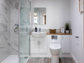 Inside the show home bathroom with walk-in shower