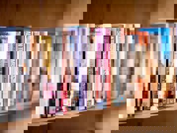 Close-up of library books on a shelf