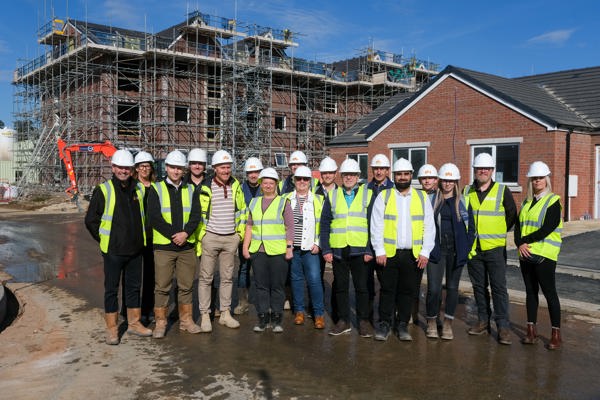 Key representatives pictured standing in front of Potter Court development for topping out ceremony 