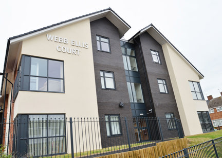 Large sign on the side of the building entrance to Webb Ellis Court