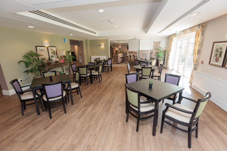 Inside the restaurant at Bowland View. Featuring a number of chairs around tables 