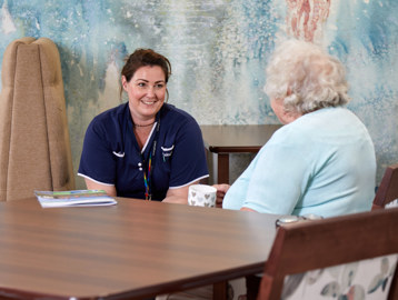 EC Linskill Park Careworker Resident Smiling Talking
