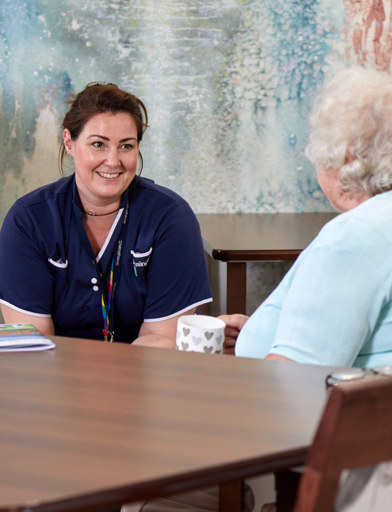EC Linskill Park Careworker Resident Smiling Talking 