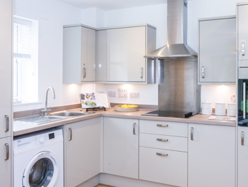 Inside the kitchen of the show home with modern appliances