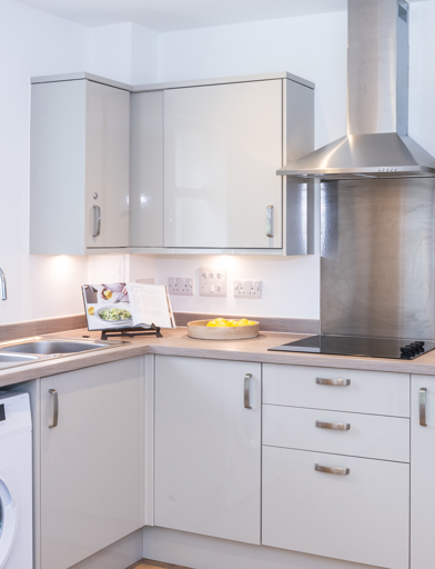 Inside the kitchen of the show home with modern appliances 