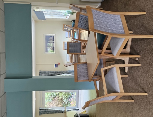 Communal dining area, tables and chairs 